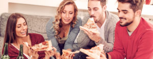 people eating pizza